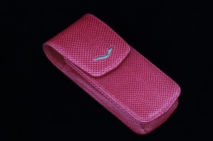 Closed case raspberry calf leather with embossed lizard skin logo in the shape of the letter V made of stainless steel